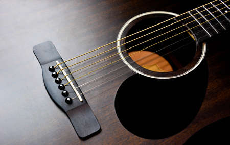 acoustic guitar on black background