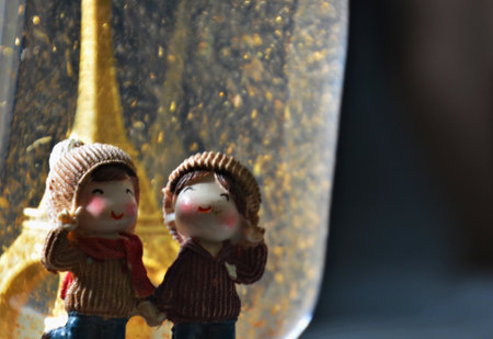 Couple of little boy and girl in winter clothes.の写真素材