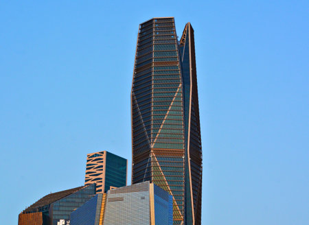 Modern buildings in the Al Olaya downtown district in a sunset sky Al Riyadh, Saudi Arabia. High...