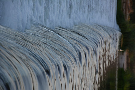 small waterfall in a riverの写真素材