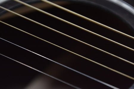 Classical guitar and classic violin up closeの写真素材