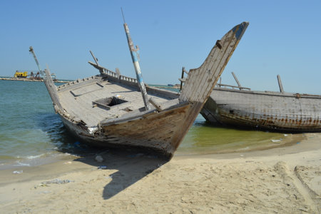 Detail and closeup of old and colored boat wooden hull,の写真素材