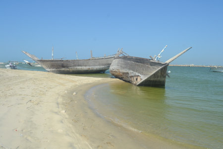An old, broken boat looks out to sea. Foggy future.