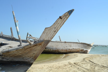 Detail and closeup of old and colored boat wooden hull,