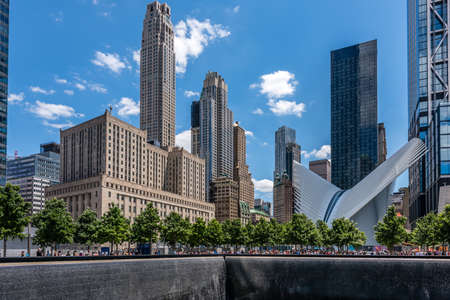 911 Memorial footprint fountain waterfall and Oculus in Lower Manhattan's Financial District of New York City.のeditorial素材