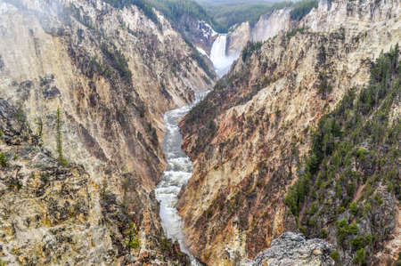 Wyoming's Yellowstone River falls through its canyon in Yellowstone National Park.の写真素材