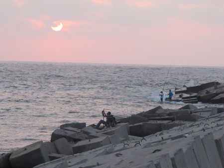 Fishing at sunsetの写真素材