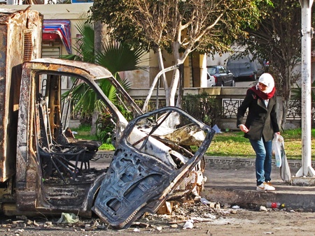 Alexandria, Egypt - January 29, 2011 - Burnt police car after the Jan. 28th demonstrations					のeditorial素材