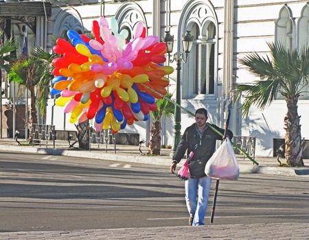 Alexandria, Egypt - November 15, 2010 - Baloon man on feast morning					のeditorial素材