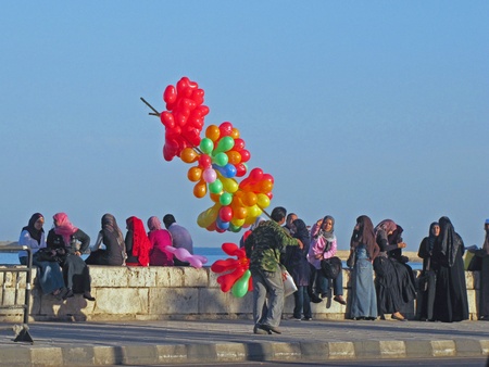 Alexandria, Egypt - November 15, 2010 - Baloon man on feast morning					のeditorial素材