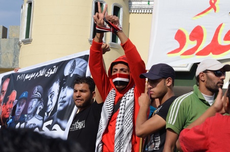 Alexandria, Egypt - Sep 30, 2011 - Egyptian demonstrators protesting the martial law and slow pace of reform のeditorial素材