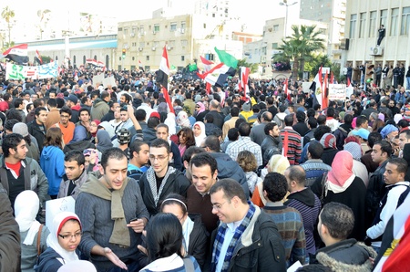 Alexandria, Egypt - Nov 25, 2011 - Egyptian demonstrating on the occasion of the first anniversary of the January 25th revolution demanding the resignation of the Supreme military councilのeditorial素材