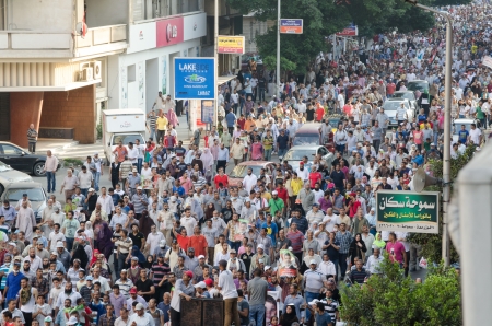 Alexandria, Egypt - August 16, 2013 -Egyptians demonstrating calling for the reinstatement of president Morsiのeditorial素材