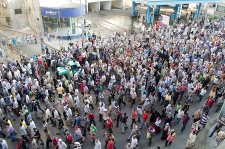 Alexandria, Egypt - August 16, 2013 -Egyptians demonstrating calling for the reinstatement of president Morsiのeditorial素材