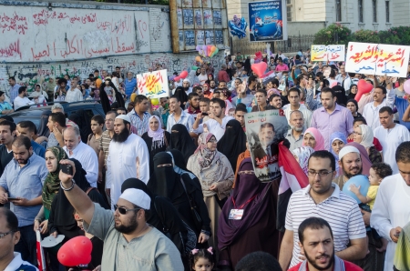 Alexandria, Egypt - August 8, 2013 -Egyptians demonstrating calling for the reinstatement of president Morsiのeditorial素材