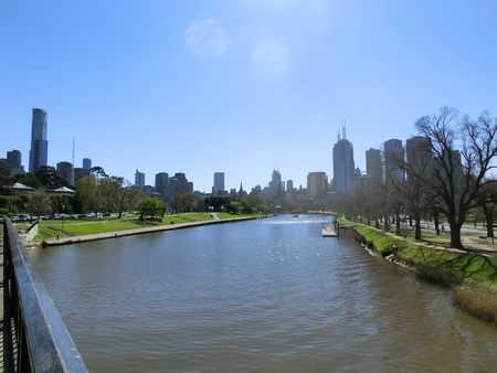 The skyline of Melbourne near Yarra River and Botanic Gardens, in Melbourne, Victoria, Australiaの写真素材