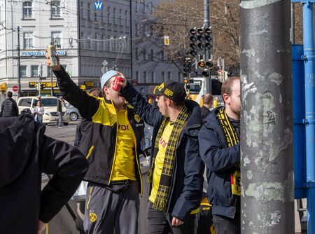 CENTRAL STATIONS, MUNICH, APRIL 6, 2019: bvb fans on the way to the soccer game fc bayern munich vs borussia dortmundのeditorial素材