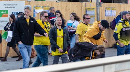 STACHUS, MUENCHEN, APRIL 6, 2019: bvb fans on the way to the soccer game fc bayern munich vs borussia dortmundのeditorial素材