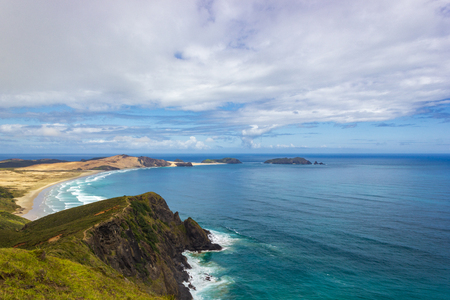 View of Cape Maria van Diamen and Te Werahi Beach by Cape Reinga. Care Reinga is part of the Te Paki Recreation Reserve on the North Island of New Zealand.の写真素材