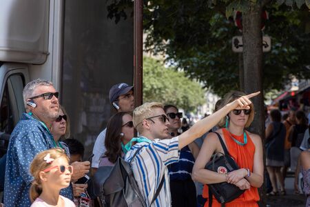 Paris, FRANCE - June 27, 2019: a group of tourists with a guide around the Notre-Dame de Paris 2 month after the fire 2019のeditorial素材