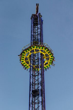 Munich, Germany - September 28: people and fairground rides at the biggest folk festival in the world.のeditorial素材