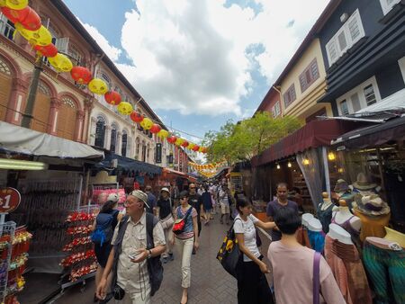 Singapore - 2016, March 27: Bustling street of Chinatown district. Singapore's Chinatown is a world famous bargain shopping destinationのeditorial素材