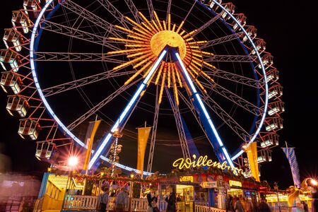 Munich, Germany - 2019, September 19: biggest ferris wheel at the Oktoberfest in Munich at nightのeditorial素材