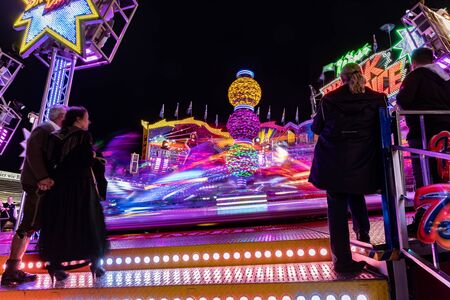 Munich, Germany, 2019 September 28: Visitors enjoy the view of an Amusement Park Ride. Breakdancer fun Ride, Oktoberfestのeditorial素材