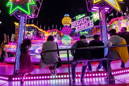 Munich, Germany, 2019 September 28: Visitors enjoy the view of an Amusement Park Ride. Breakdancer fun Ride, Oktoberfestのeditorial素材
