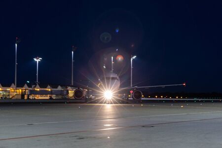 Munich, Germany - April 19, 2019 : Airplane on tarmac at Munich Airport on Terminal 2, named Franz Josef Strauss Airport.の写真素材