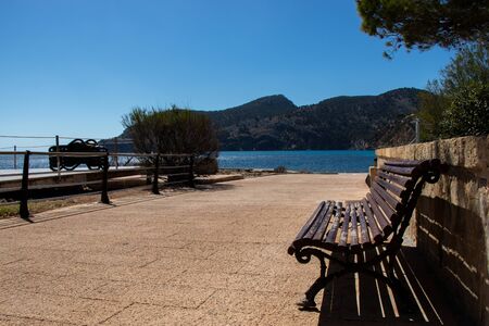 Coast promenade bench turquoise sea water view, camp de mar, Majorca island