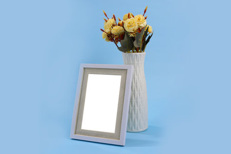 Blank frame for inserting pictures decorated with yellow flowers.の写真素材