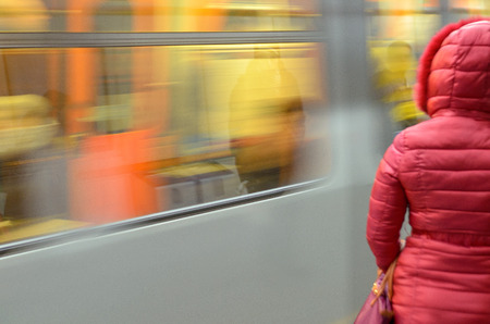 Blurred motion of car with passengers at metro stationの写真素材