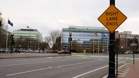 A right turn ends sign in Washington, DC on an overcast day. Sliding Shot. の写真素材