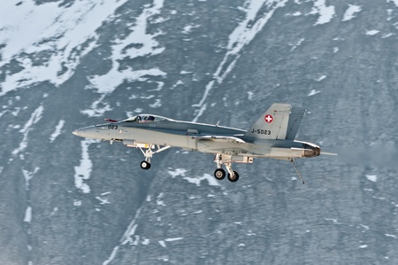 Axalp, Switzerland - October 11, 2011 - Swiss Air Force F/A-18 Hornet during training before...