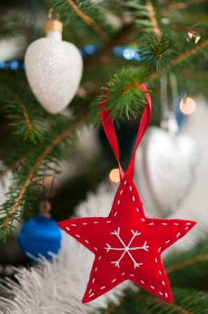 Christmas tree decoration handmade of feltの写真素材