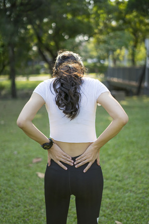 beautiful women nice figure resting after run in parkの写真素材
