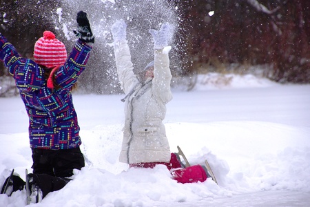 Girls playing in the snowのeditorial素材
