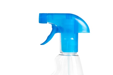 Spray bottle head against a white background