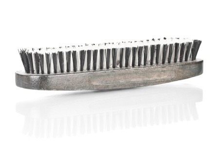 Old, used, shoe brush over a white backgroundの写真素材
