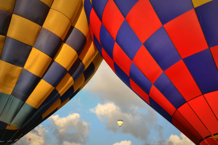 two neighboring balloons that look like a curtain on the skyの写真素材