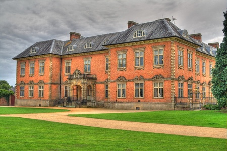 An HDR image of the seventeenth century stately home Tredegar House is a first class example of a red brick mansionの写真素材