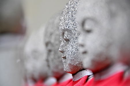 Rows of the small japanese Jizo statuesの写真素材