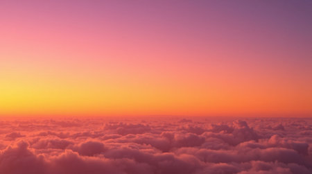 Beautiful sunrise above the clouds. Panoramic view above the clouds.