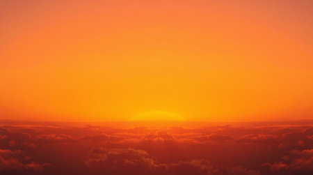 Beautiful sunset above the clouds in the sky. Nature background.の写真素材