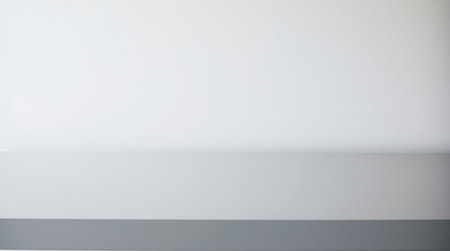 Empty white table top on white wall background. For product display.