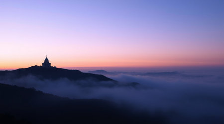 Panoramic view of the church in the fog at sunrise.