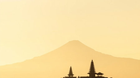 Silhouette of temple with Mount Fuji in the background
