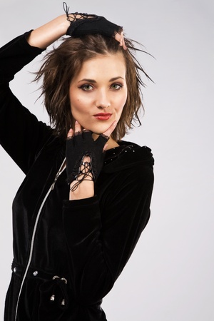 Fashion portrait of beautiful woman in black clothingの写真素材