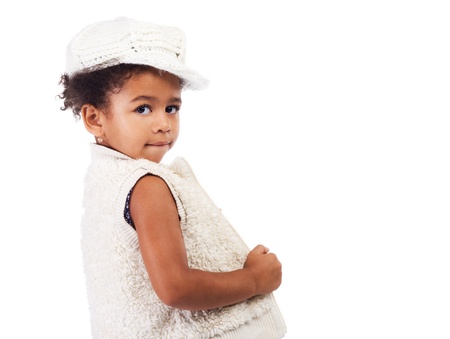 Beautiful stylish little girl in white clothingの写真素材